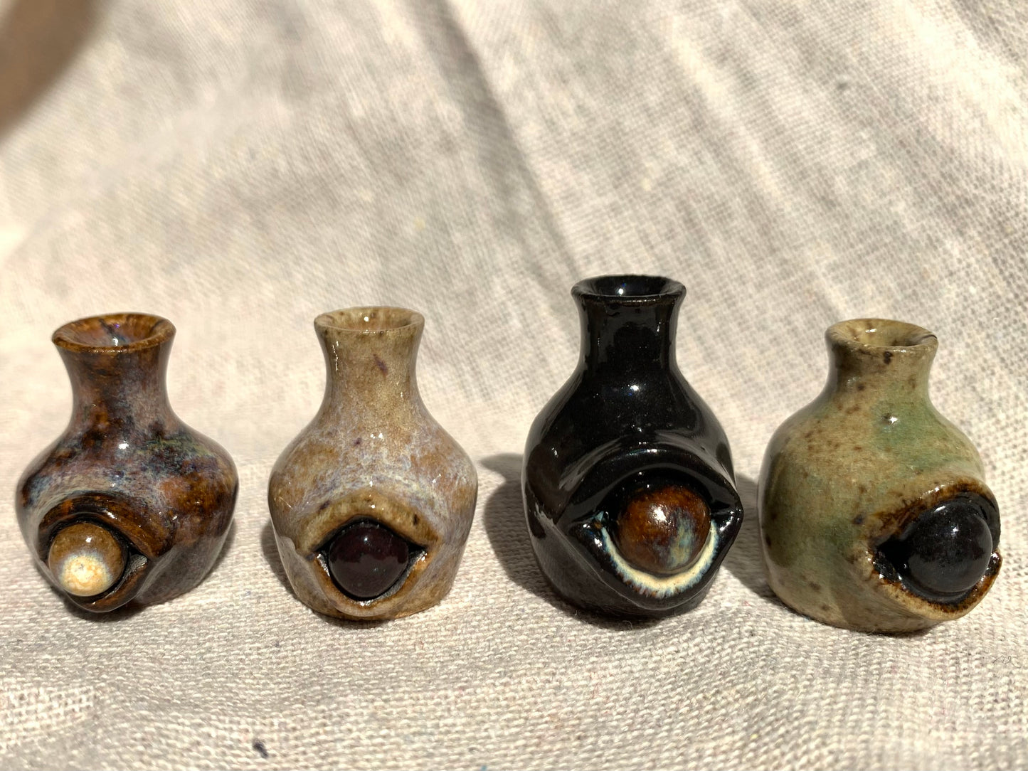 Miniature vase with eye