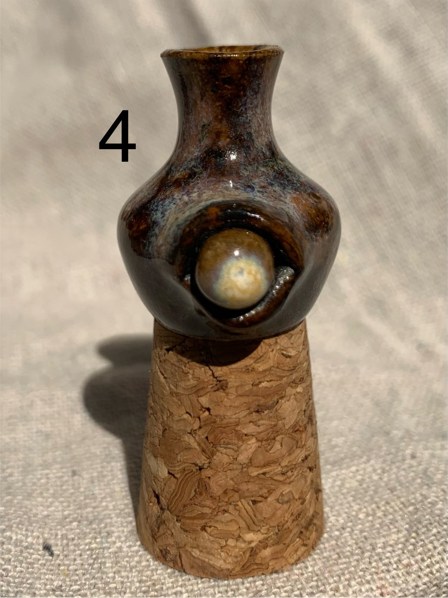 Miniature vase with eye