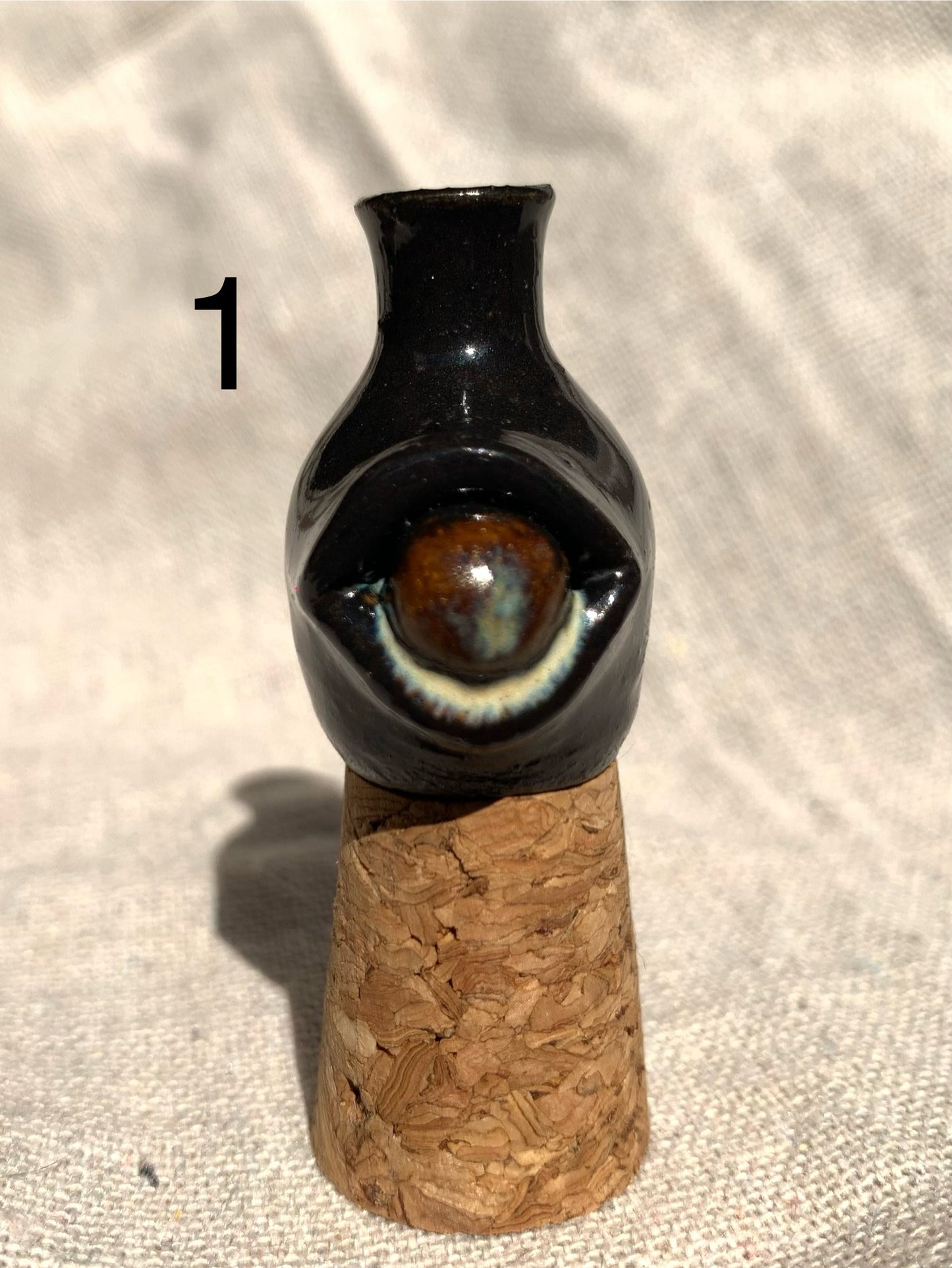 Miniature vase with eye