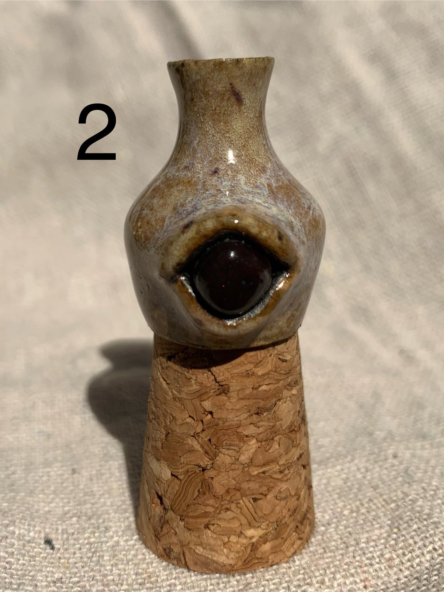 Miniature vase with eye