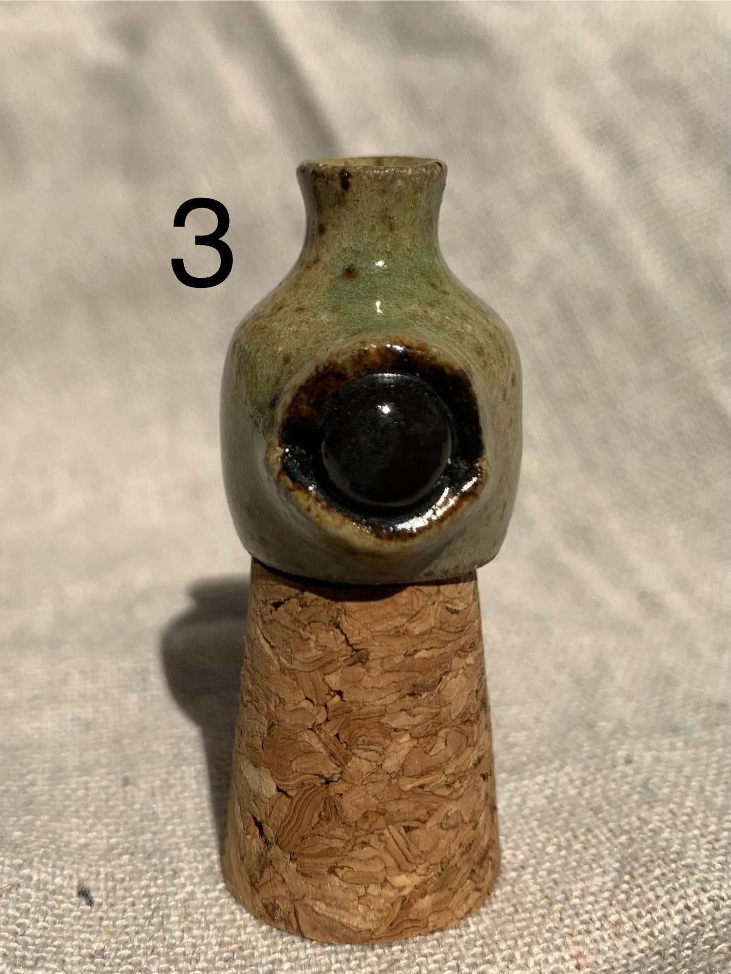 Miniature vase with eye